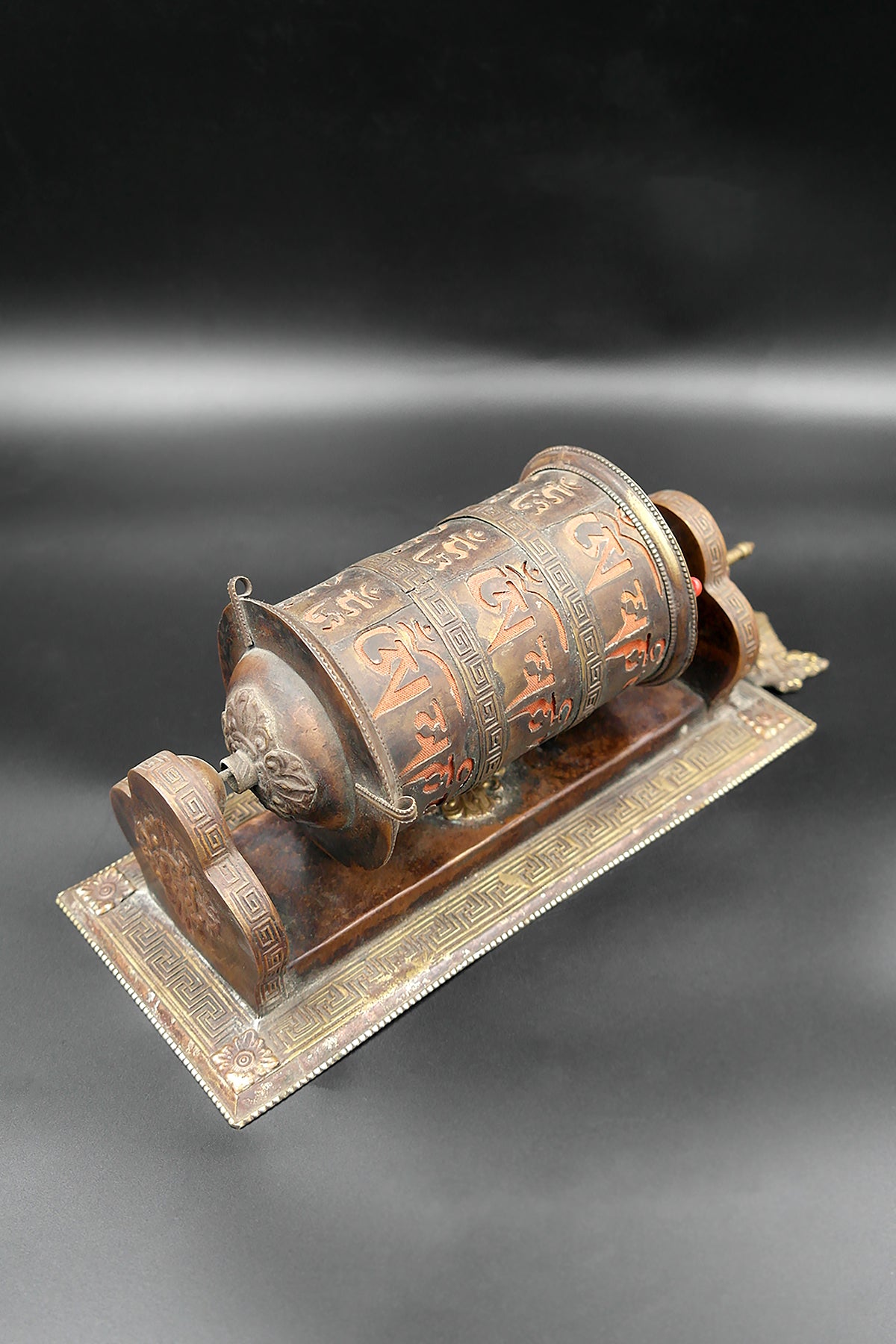 Antique Wall-mounted Om Mani Padme Hum prayer wheel that brings peace