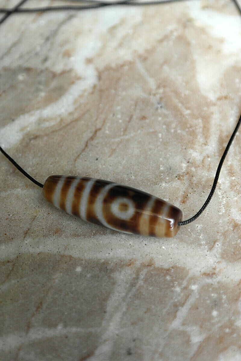 Antique Tibetan two eyes Dzi Beads Pendant in nylon string 39mm | Vajracrafts