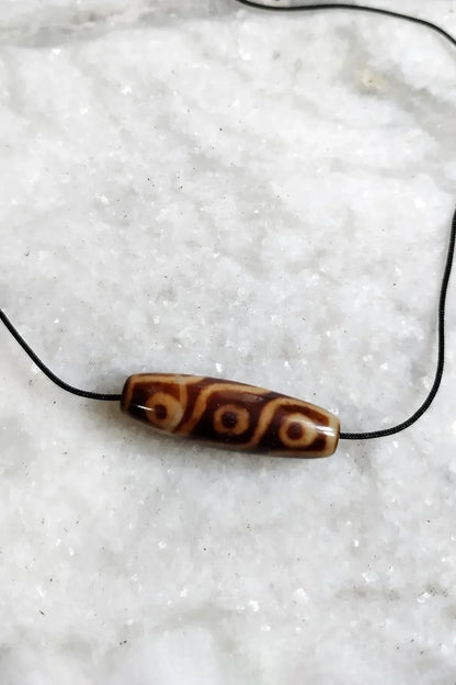 Nine Eyed Tibetan Dzi Beads for Spiritual Empowerment - Vajracrafts