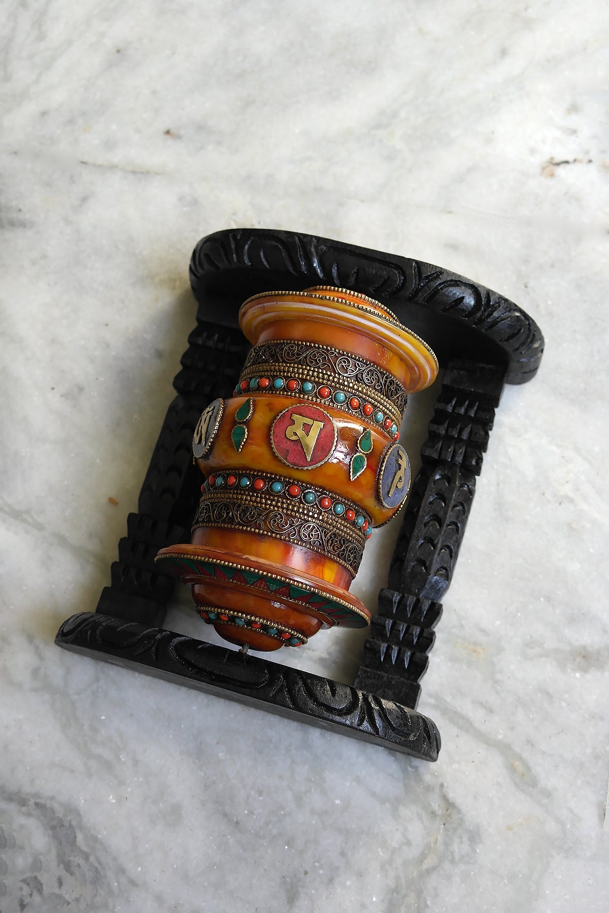 Om Mane peme hum on Gemstone in Prayer Wheel with black frame