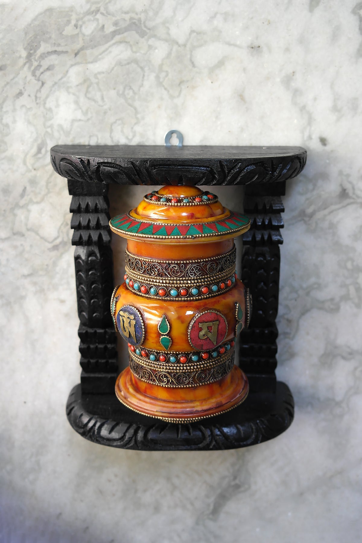 Om Mane peme hum on Gemstone in Prayer Wheel with black frame