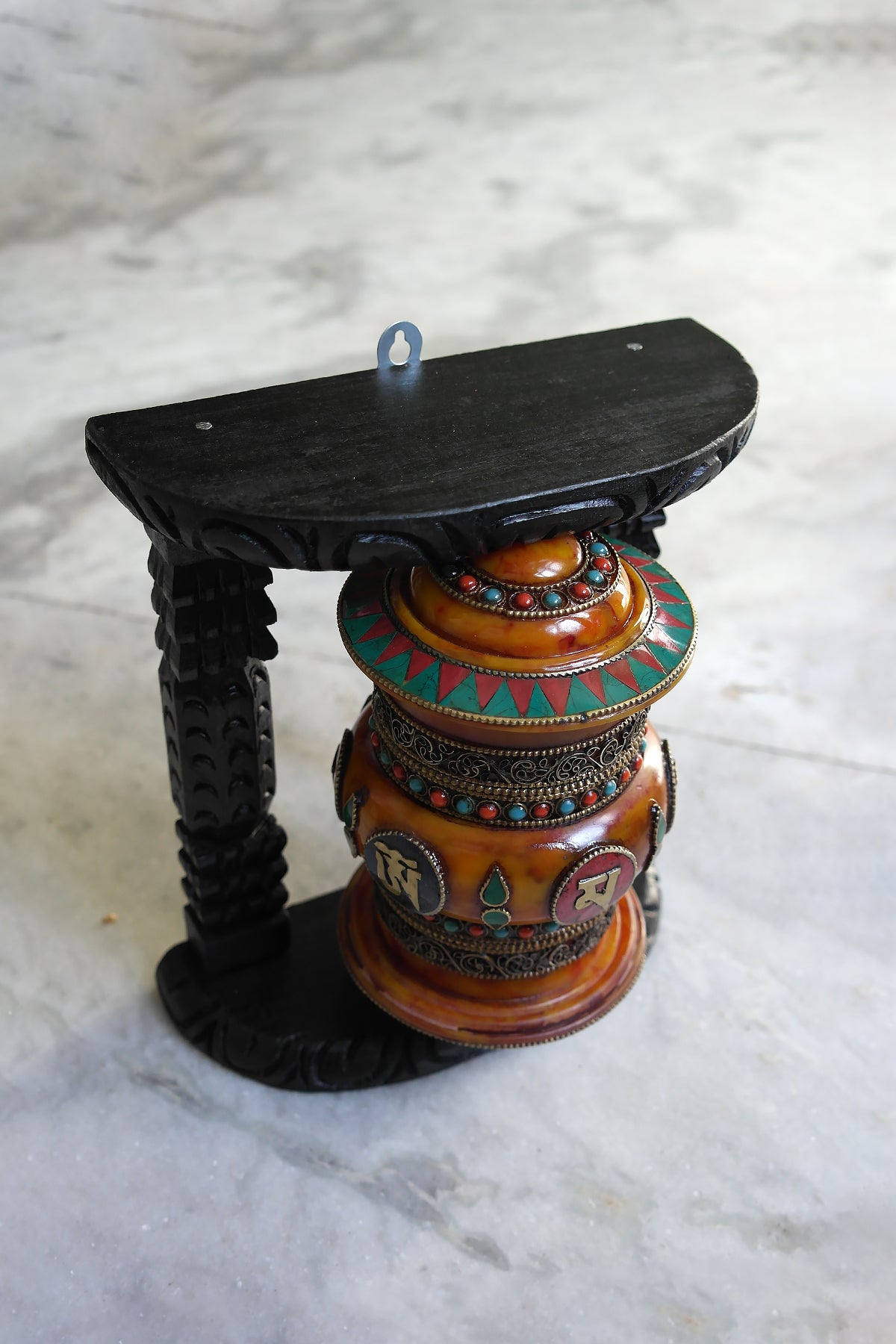 Om Mane peme hum on Gemstone in Prayer Wheel with black frame