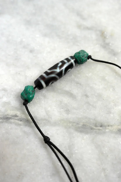 Three Eyed Tibetan Dzi Beads for Spiritual Empowerment - Vajracrafts