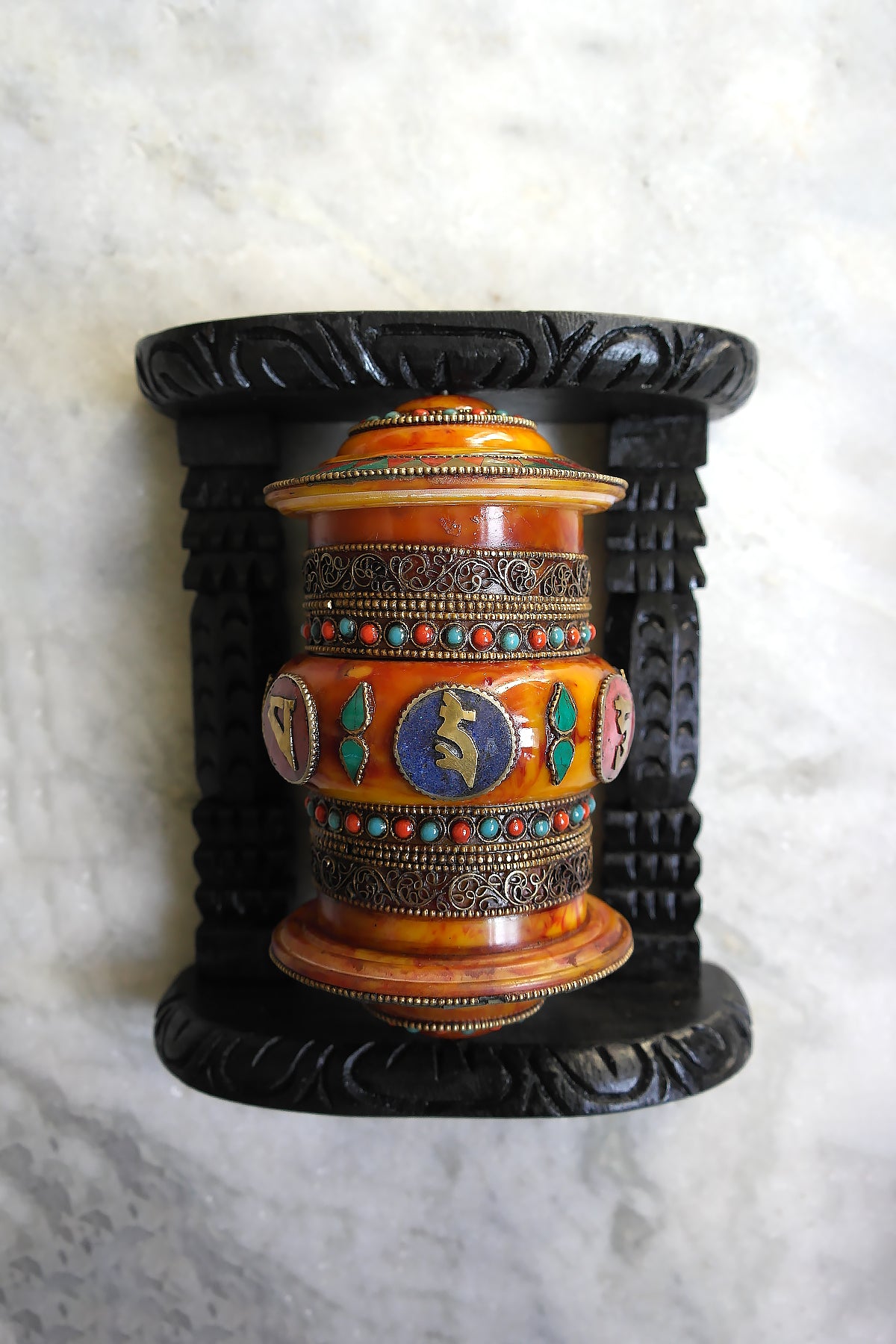 Om Mane peme hum on Gemstone in Prayer Wheel with black frame