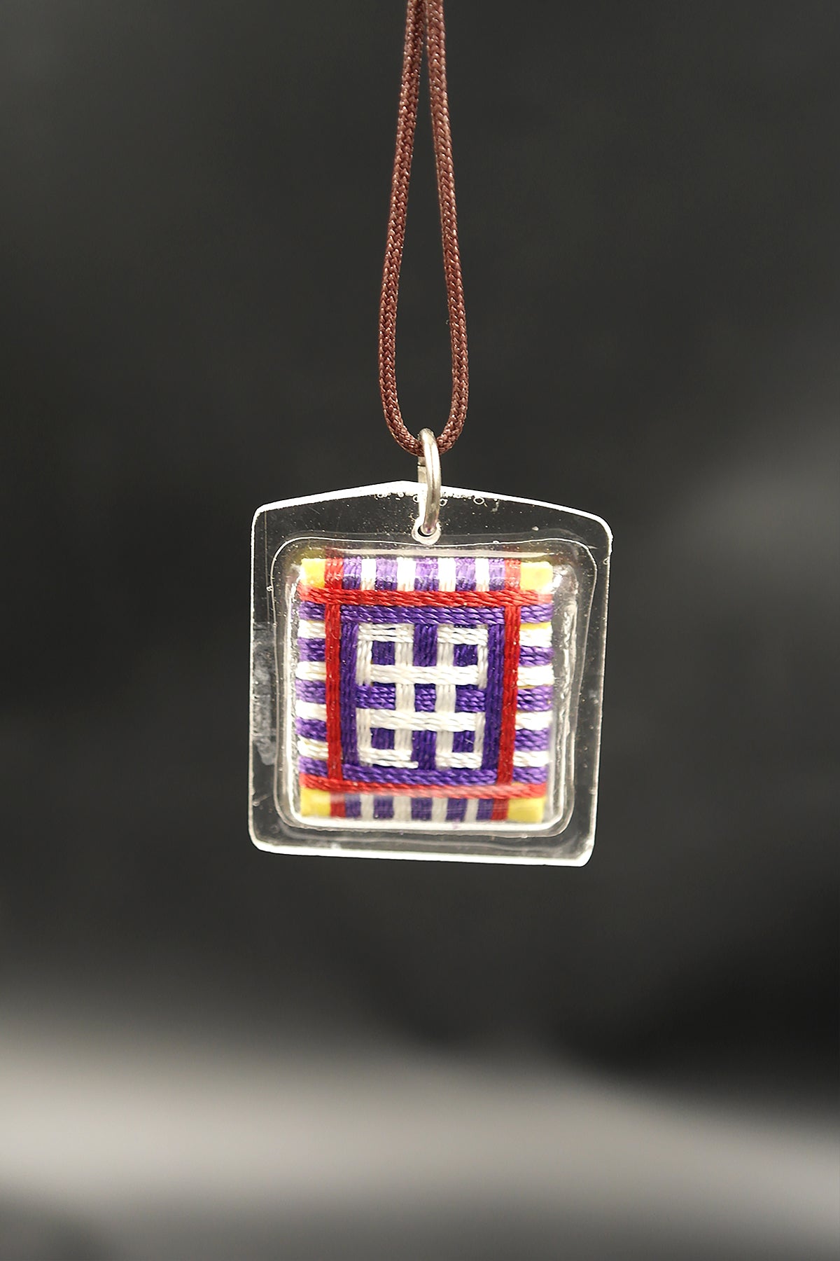 Honor the fierce compassion of Mahakala with Tibetan Sungkhor amulet pendant