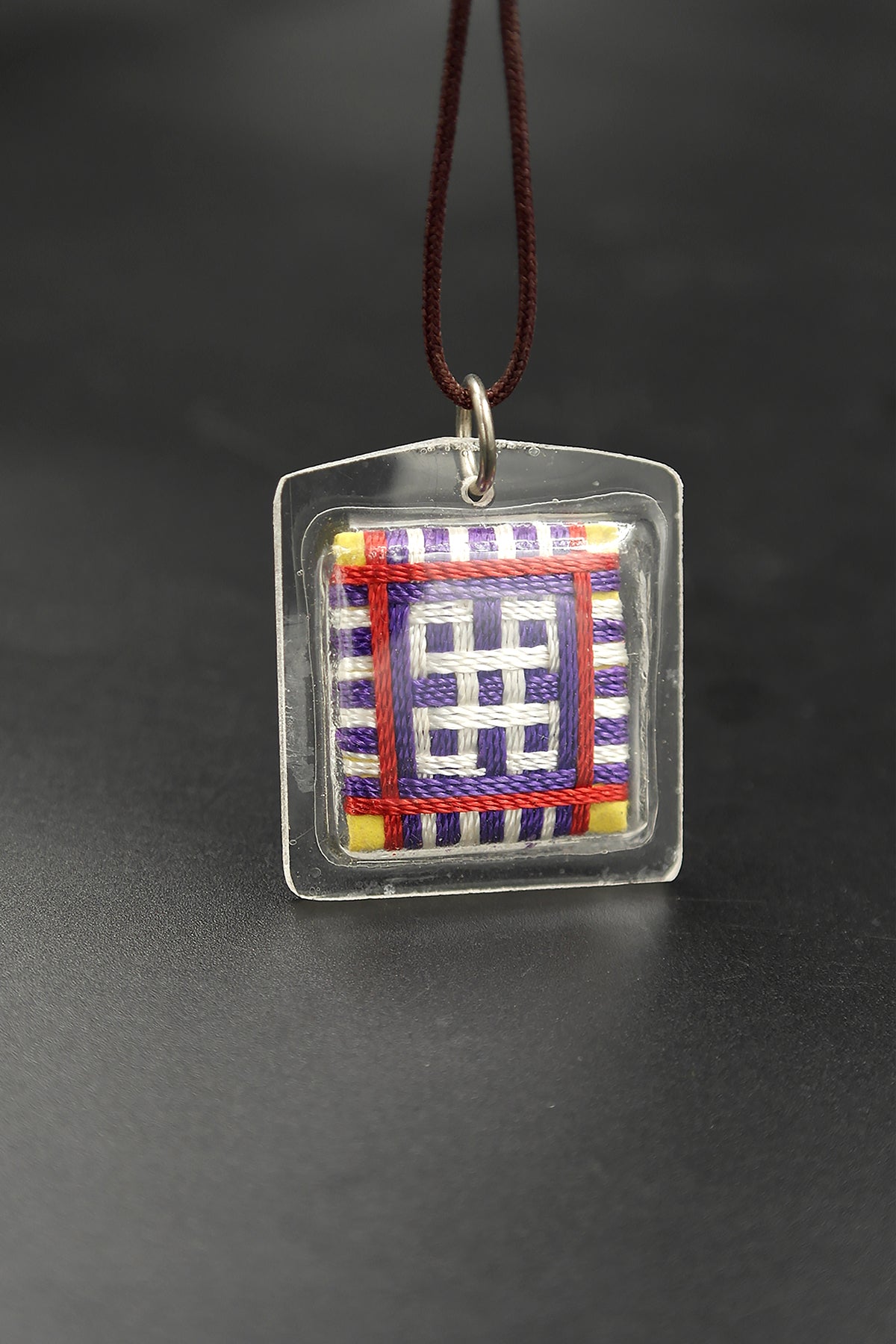 Honor the fierce compassion of Mahakala with Tibetan Sungkhor amulet pendant